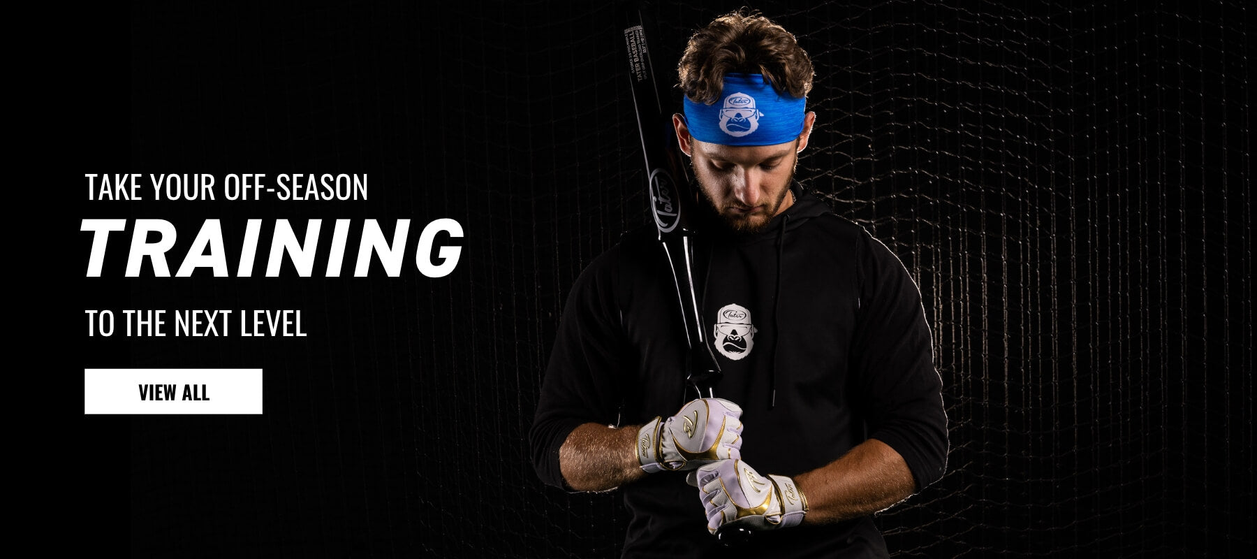 Justin Guerrera, professional baseball player of the New York Mets holding Tater's patent pending Overload Split Grip Training bat.