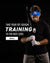 Justin Guerrera, a professional baseball player of the New York Mets, holds Tater's patent pending Overload Split Grip Training bat while wearing a black hoodie and blue headband showcasing the white Tater Kong. He also has on white Tater batting gloves.