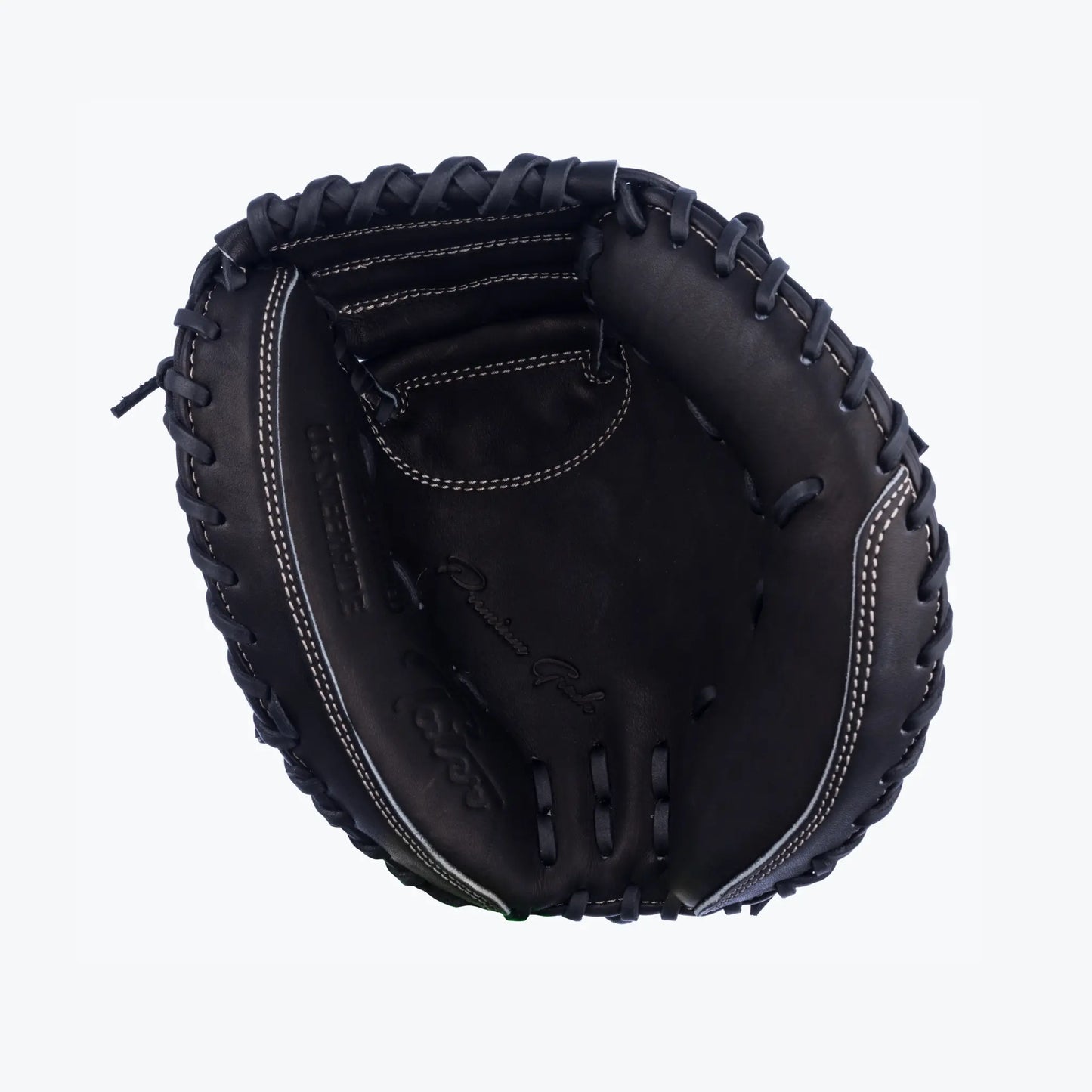 This image showcases the inside view of Tater Baseball's black catcher's mitt, a 28-inch mini trainer. The mitt's compact design is emphasized by the detailed white stitching and embossed logo, engineered for catchers to practice and master their craft with a focus on control and quick transfer.