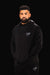 Long sleeve black athletic fitness hoodie with stylized TB on the chest